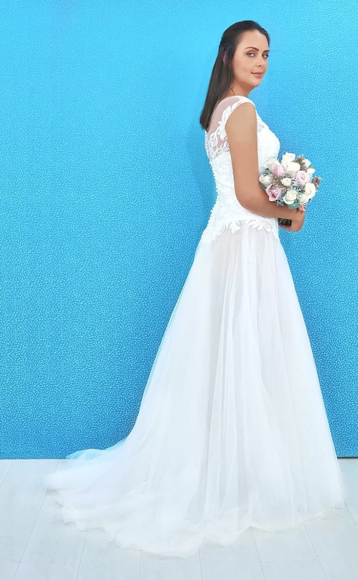 Un diseño de vestido de novia que expresa feminidad y confianza.